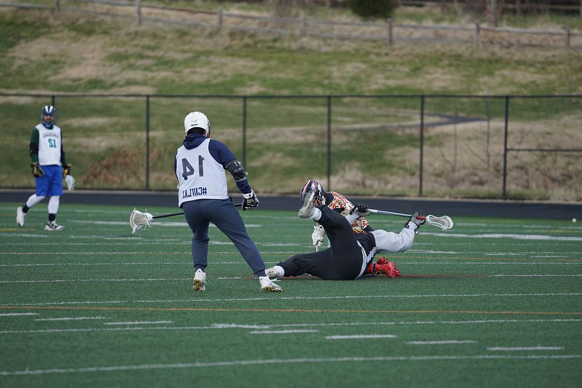 human four men playing on the field apparel
