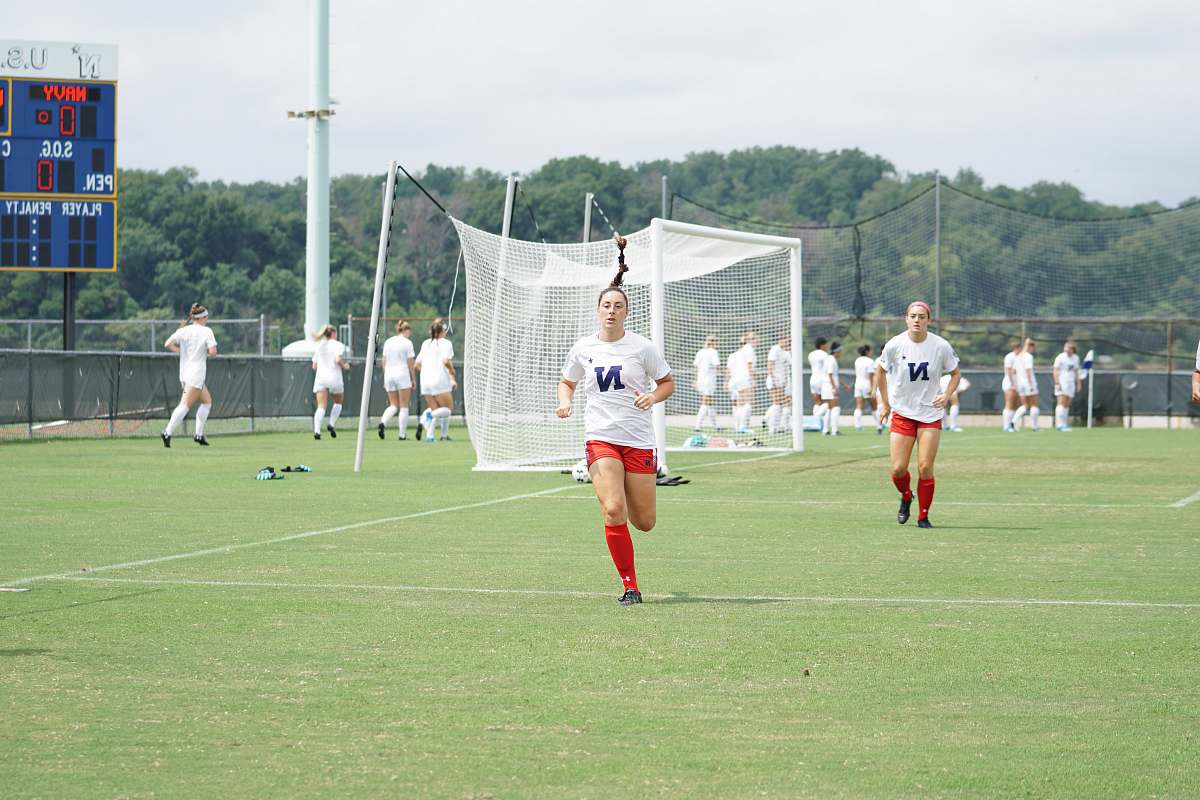 people girl playing soccer during daytime human
