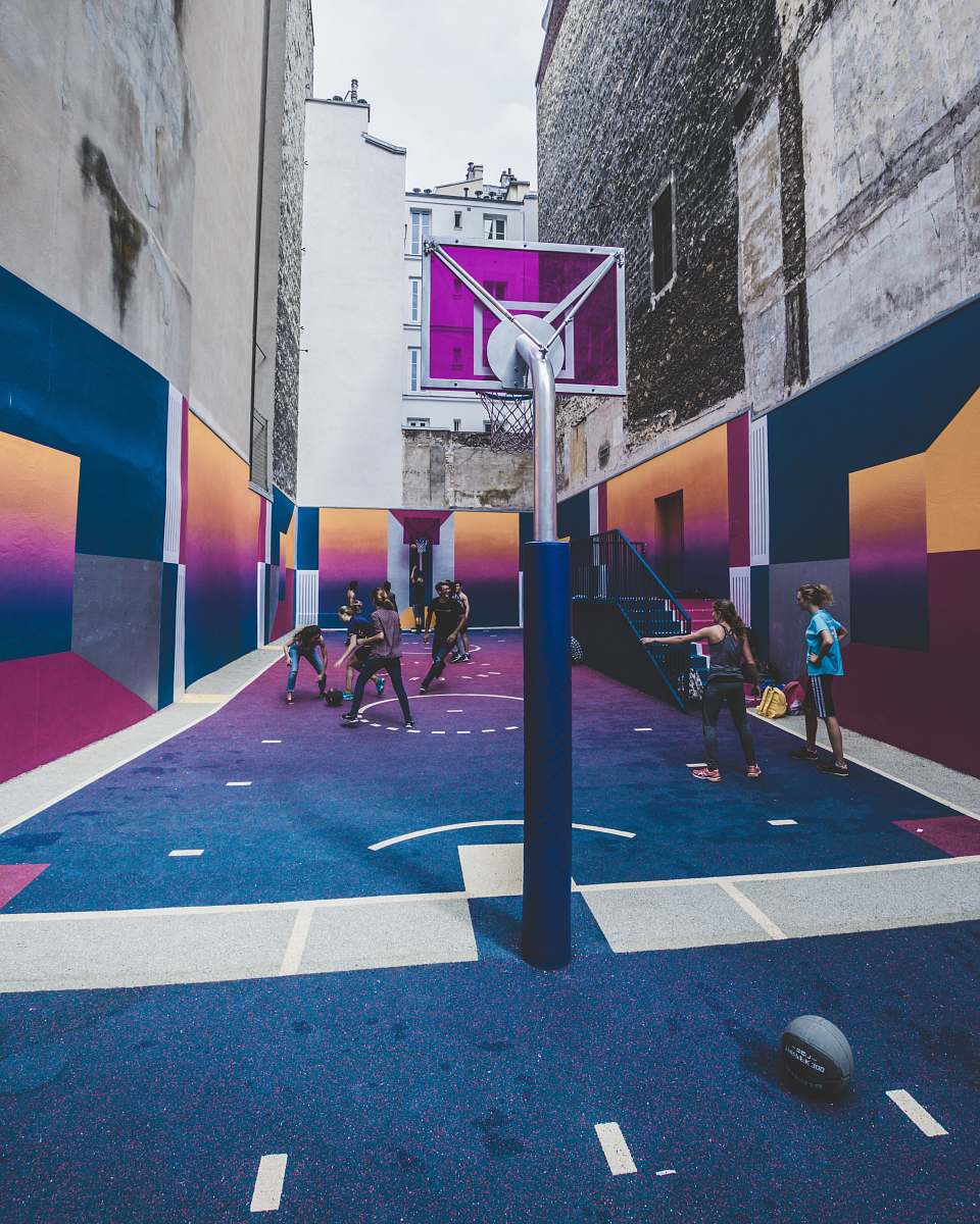 sport group of men playing basketball on alleyway basketball