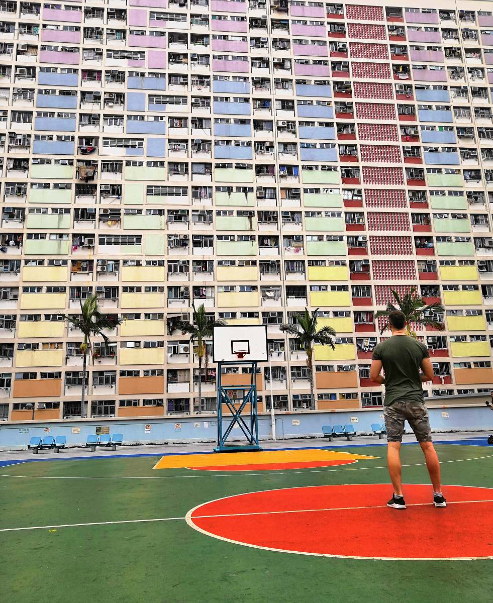 human man in basketball court building