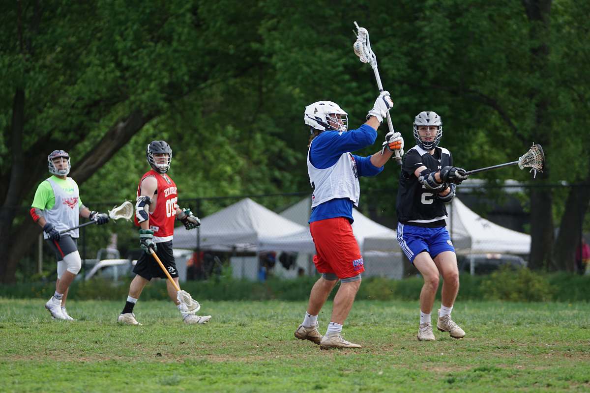 human men playing lacrosse apparel