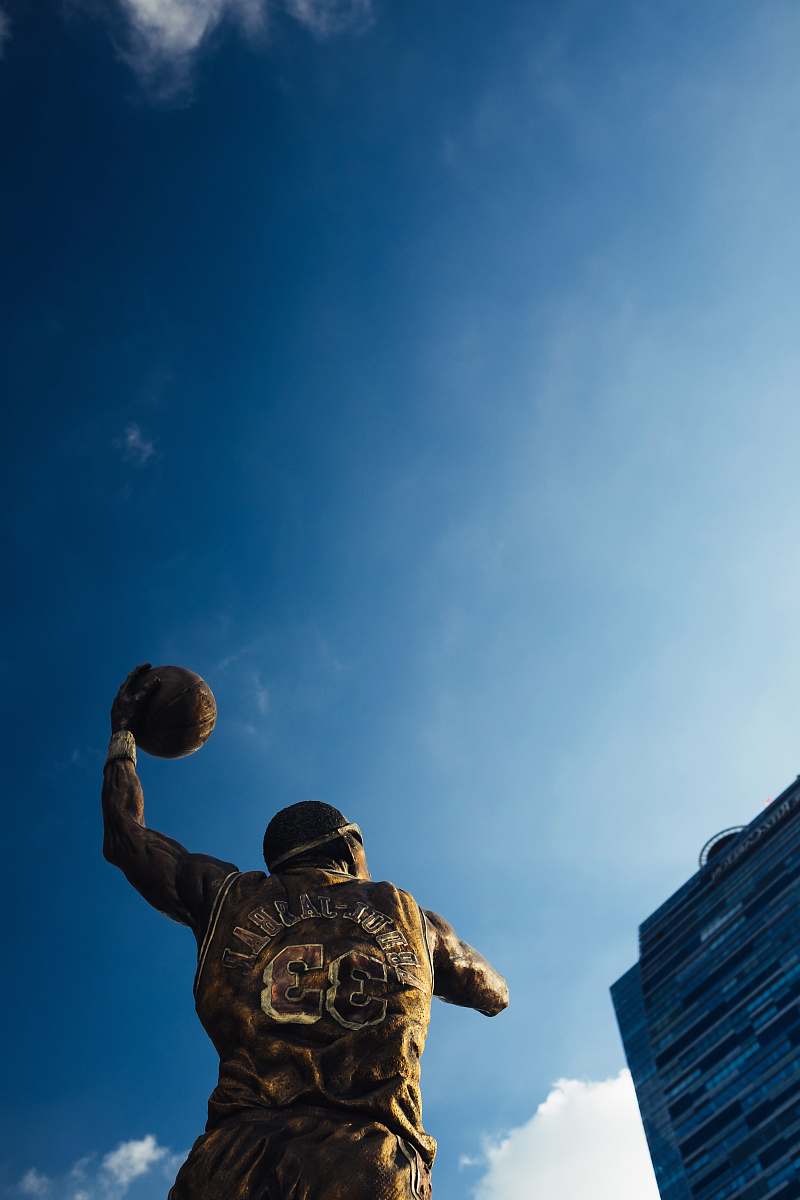 human NBA player statue blue