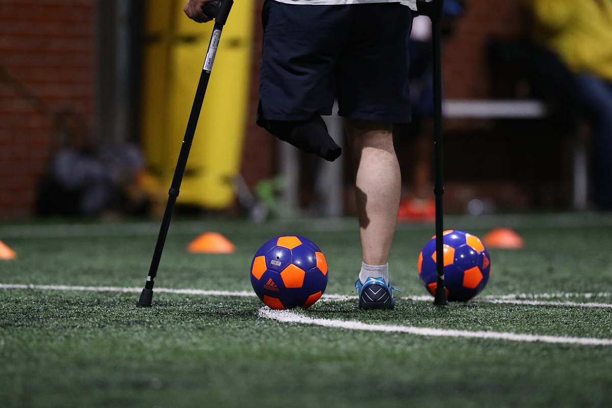 human person playing soccer ball sphere