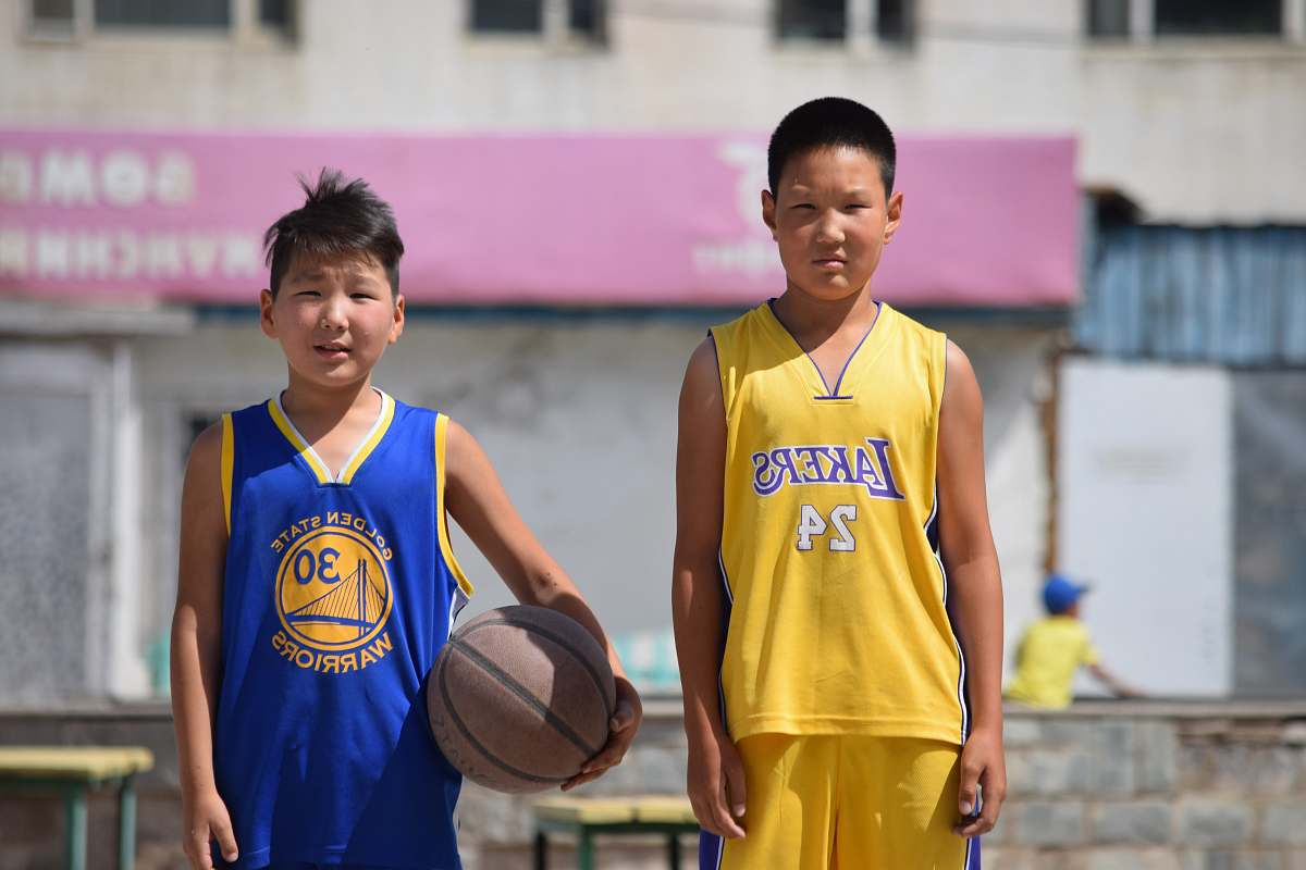 human two boy standing near each other people