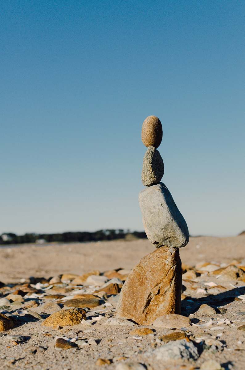 ground shallow focus photo gray balance stone barnstable county