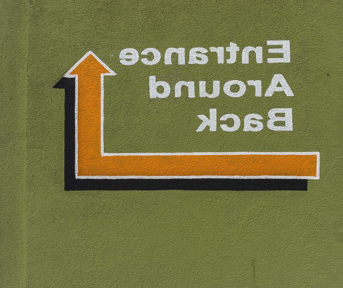 field entrance around back signage building