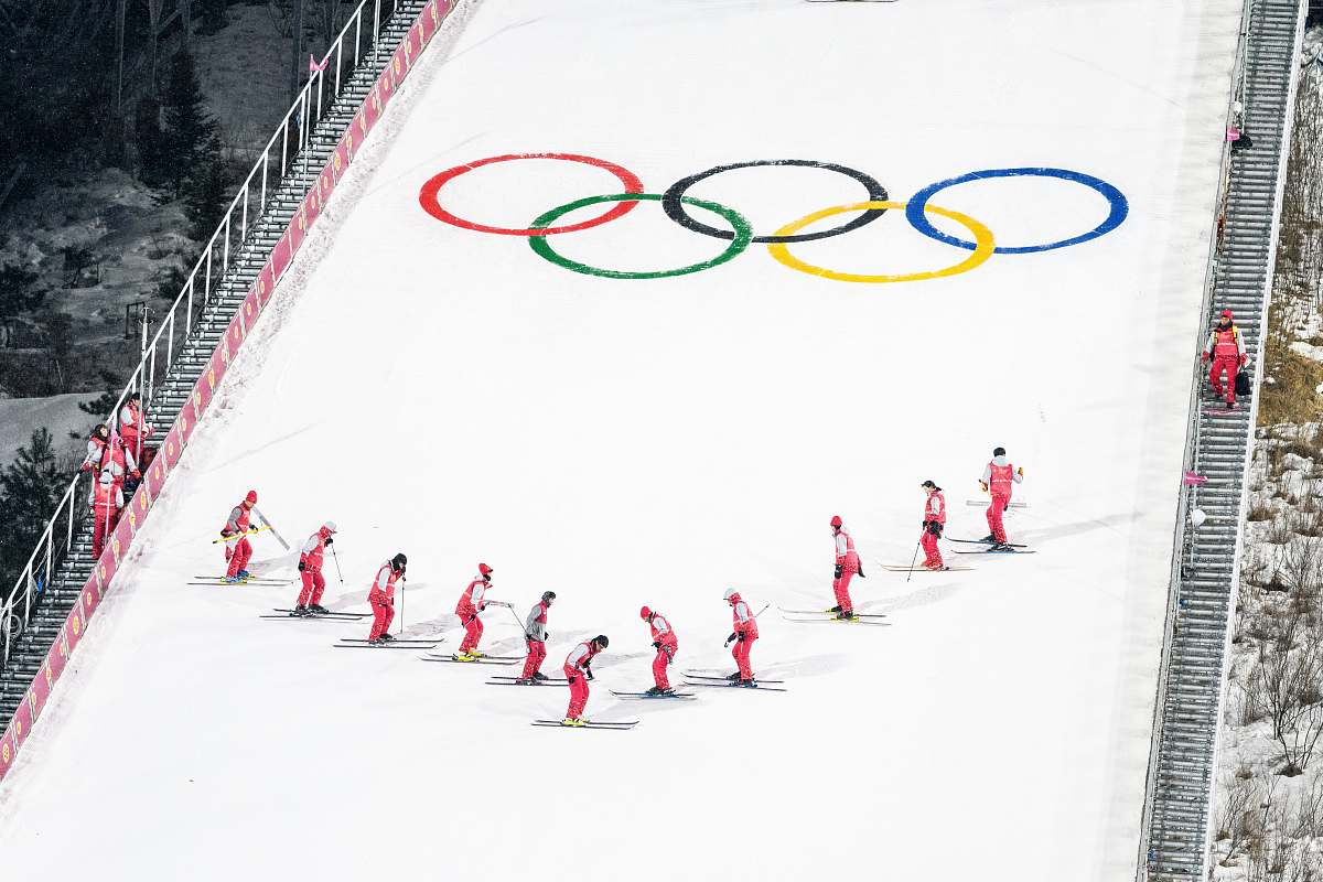 snow people skiing during Winter Olympics white