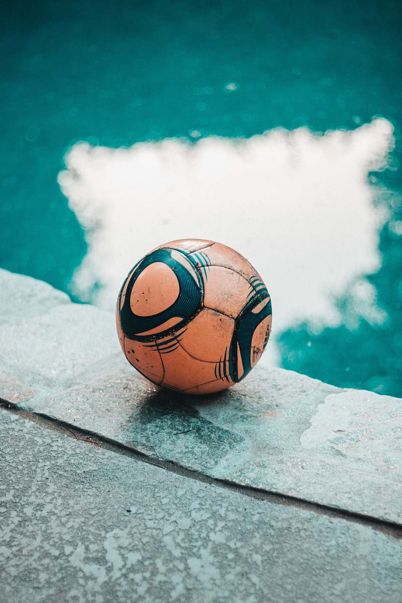 ball orange and black ball football