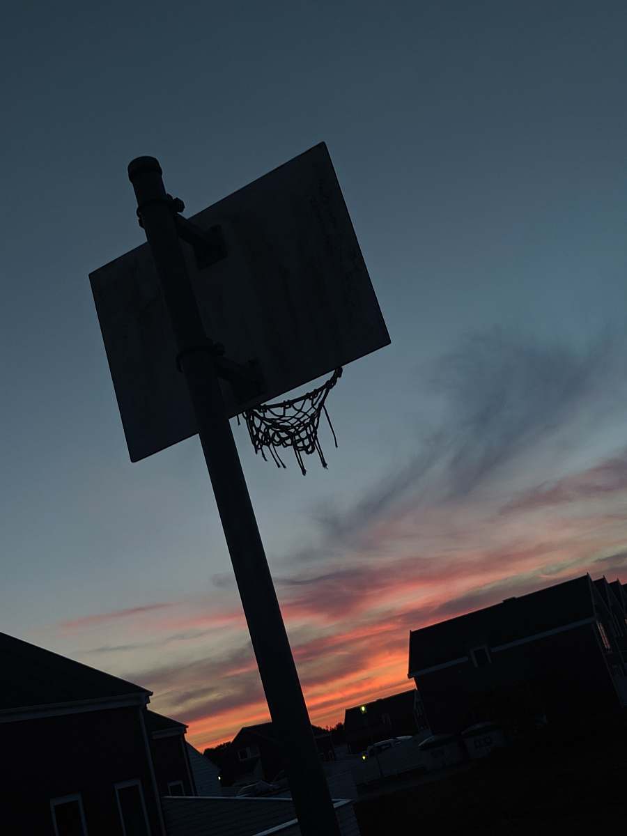 grey basketball system near house basketball
