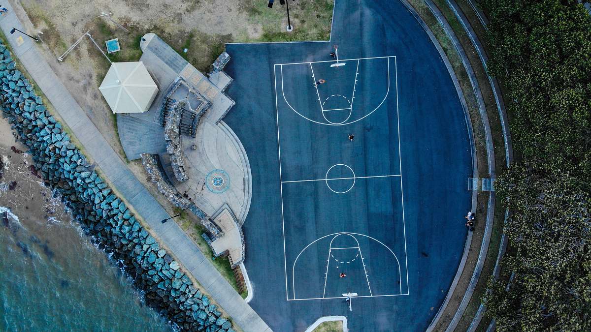 basketball blue floored basketball court by the beach sports