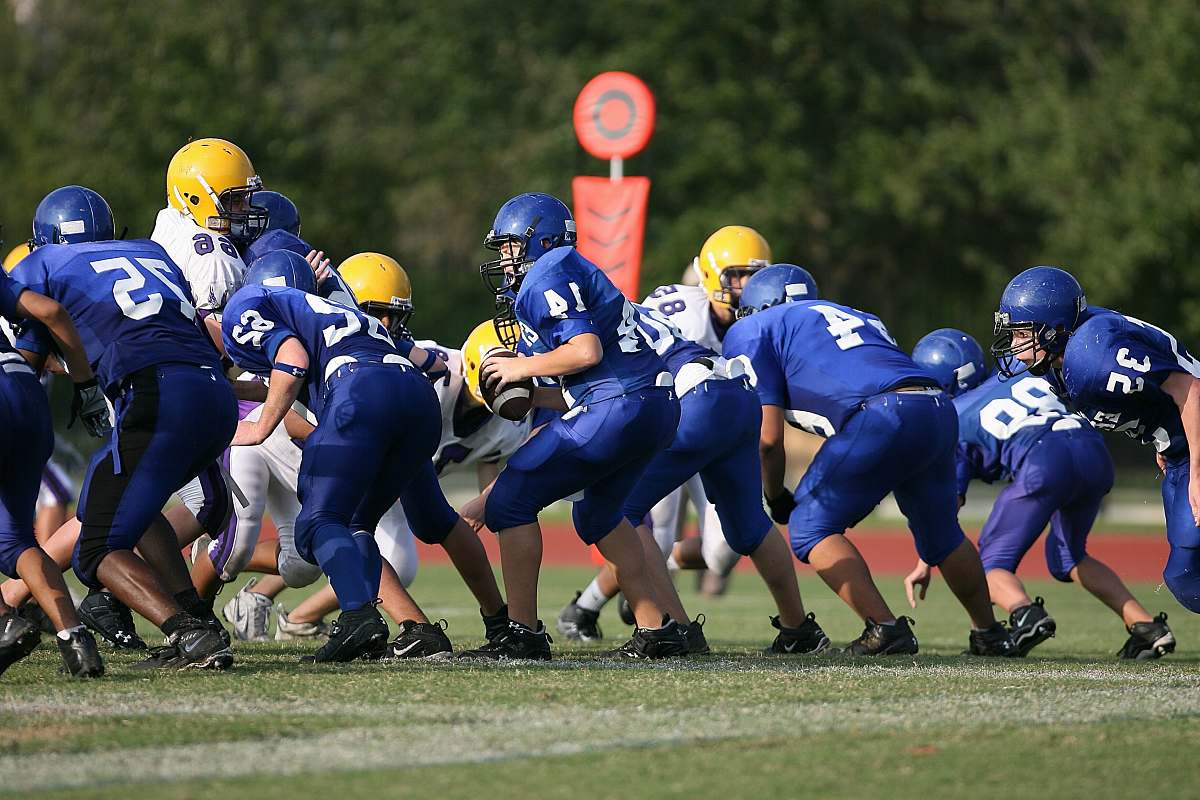football football players on football field american football