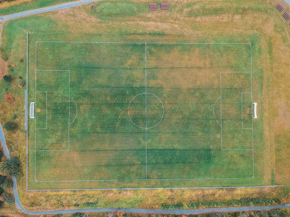 field green and brown soccer field sports