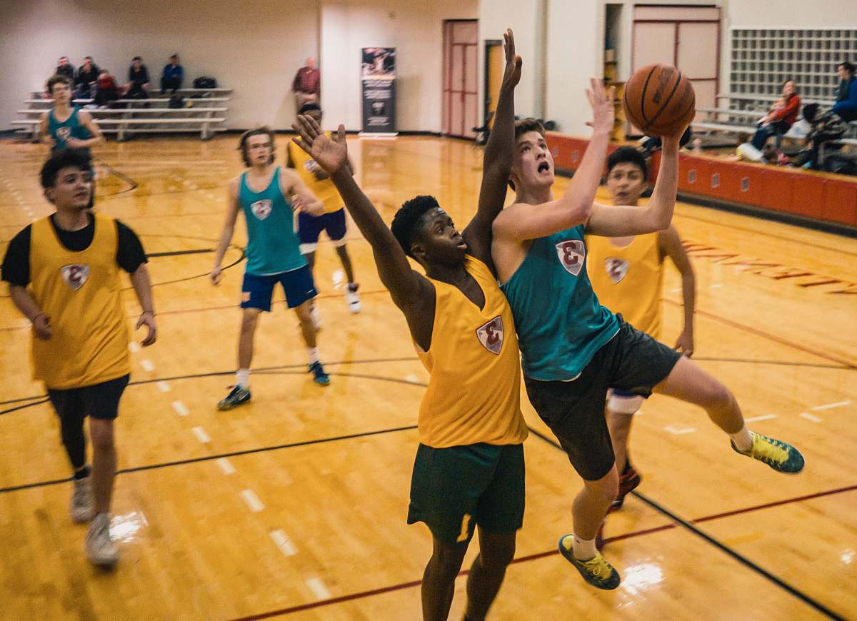 team group of people playing basketball people