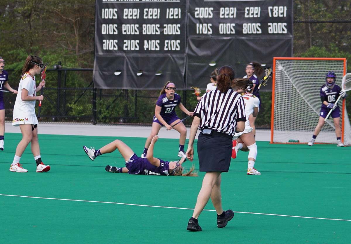 people group of woman playing lacrosse hockey
