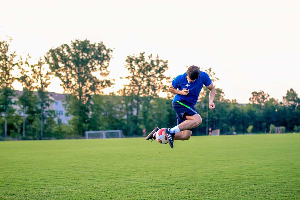 football man playing soccer soccer