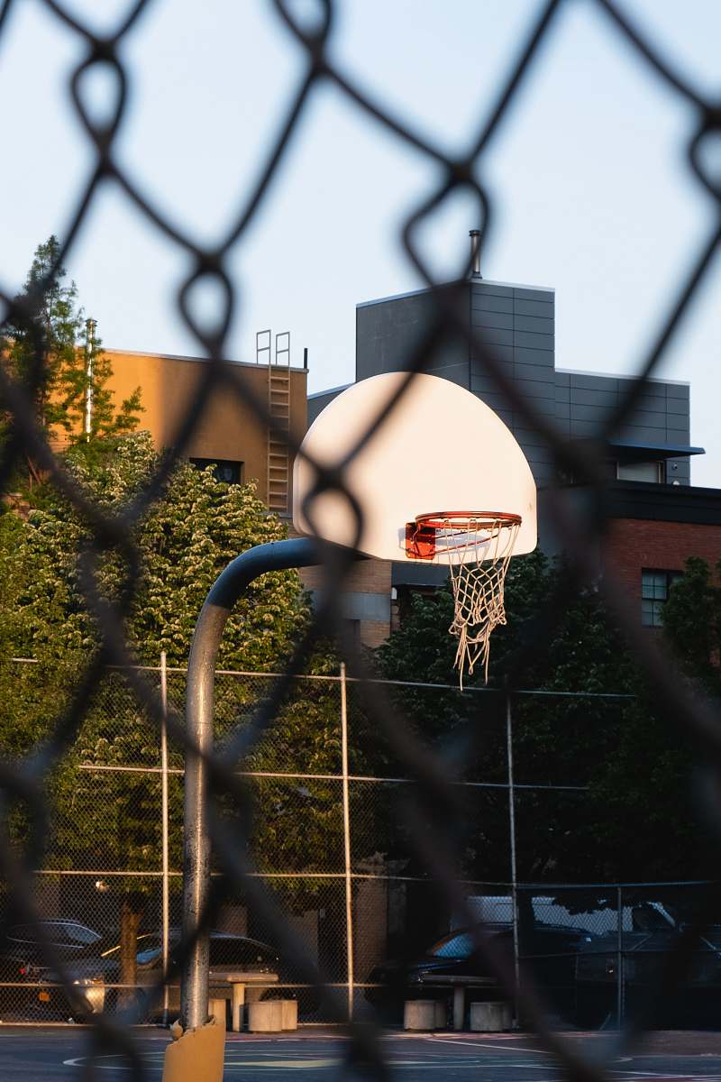 sports white and orange outdoor basketball hoop and board team