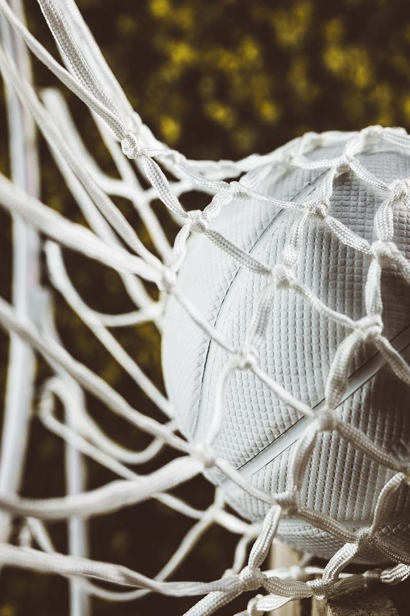 grey white ball in net in close-up photo furniture