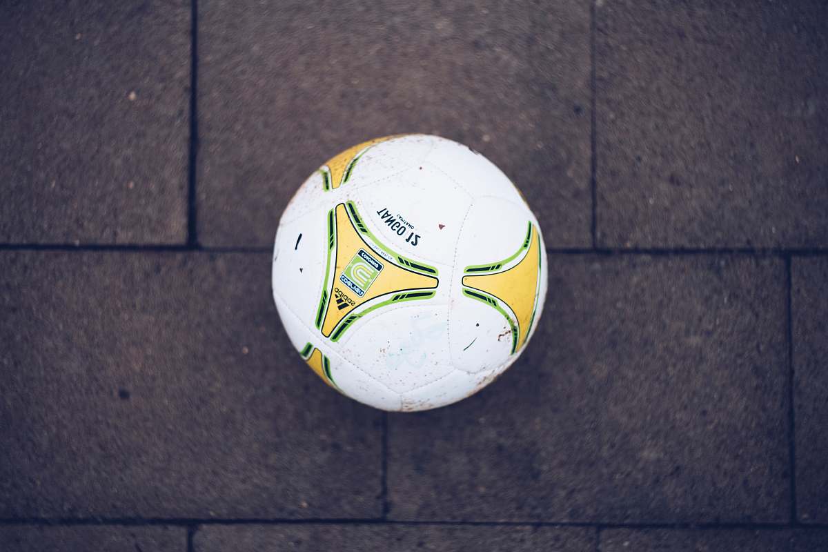 soccer white, yellow, and green soccer ball football
