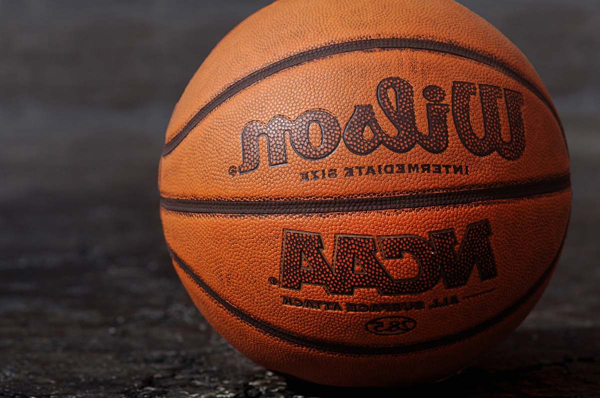 sports Wilson NCAA basketball on black board basketball