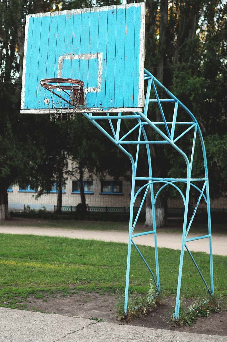 sport blue basketball hoop during daytime team