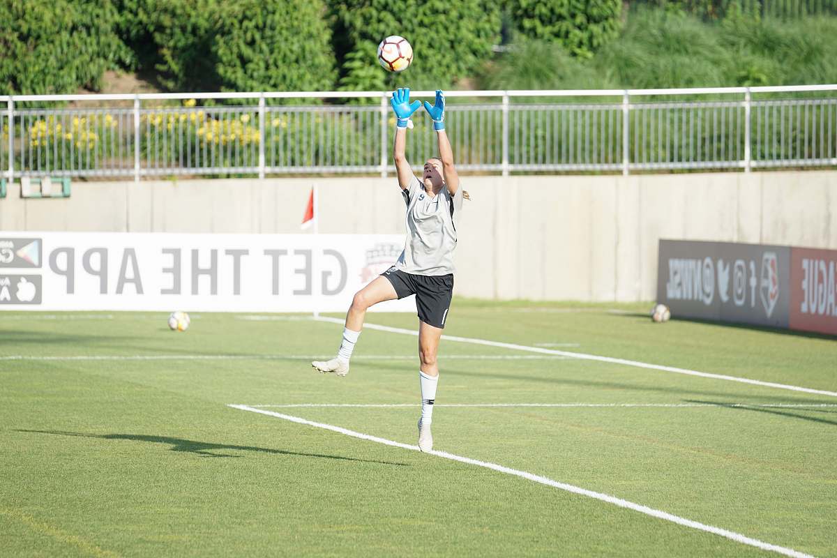 sport woman playing soccer ball tennis
