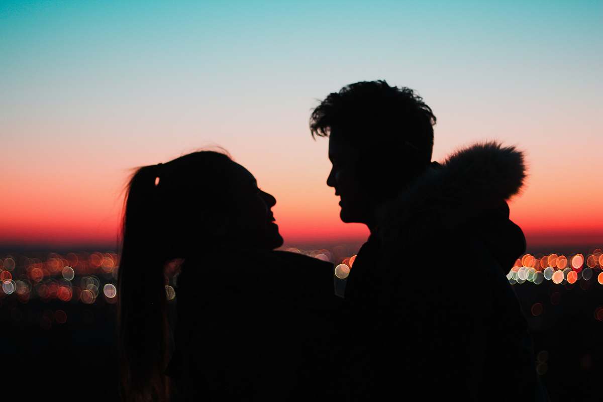  silhouette of man and woman near outdoor 