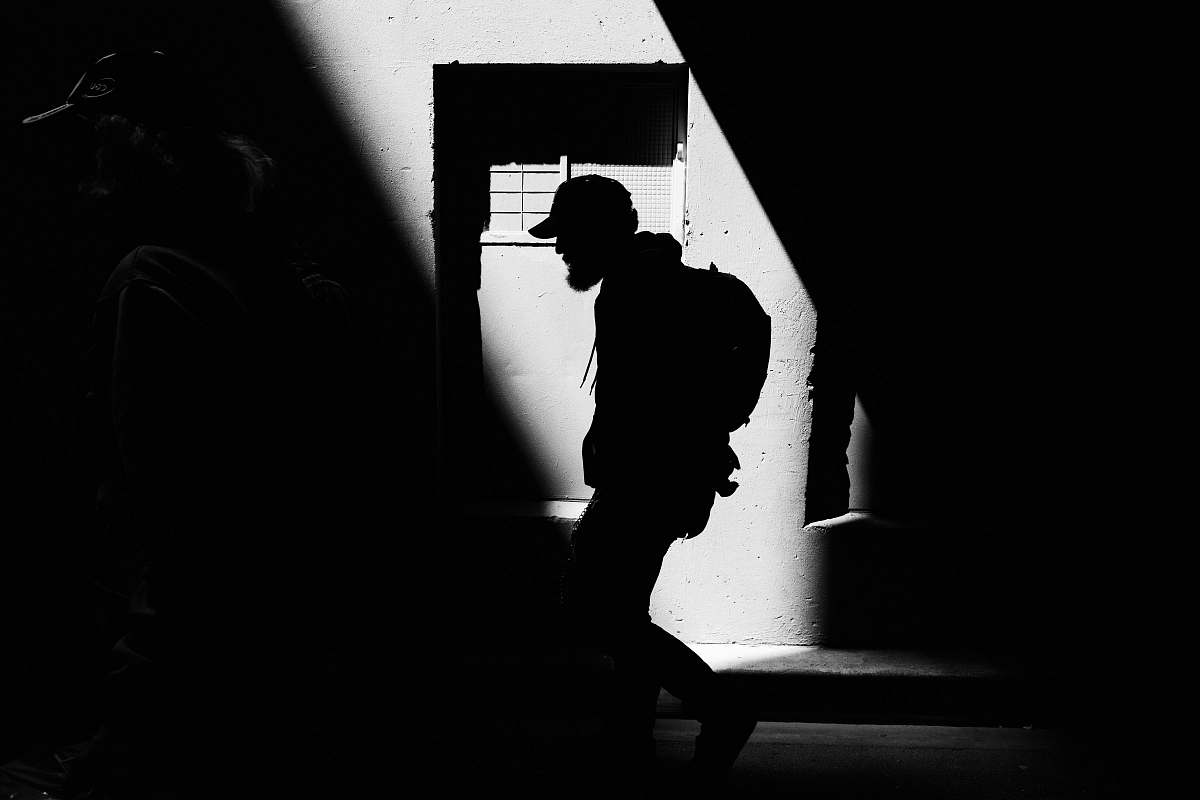 Silhouette Person Carrying Backpack Walking On Street Melbourne Image ...