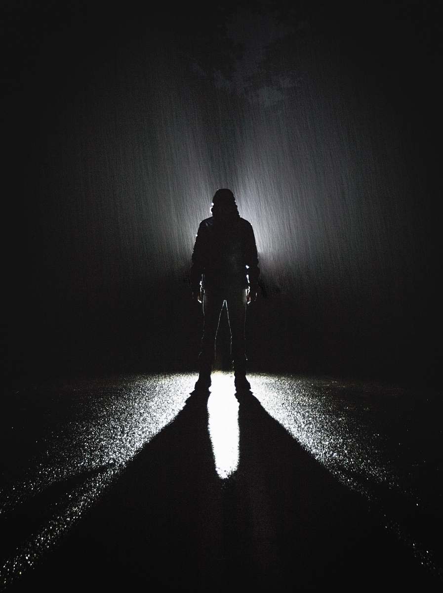 Person Silhouette Of Person Standing On Road During Rain People Image ...