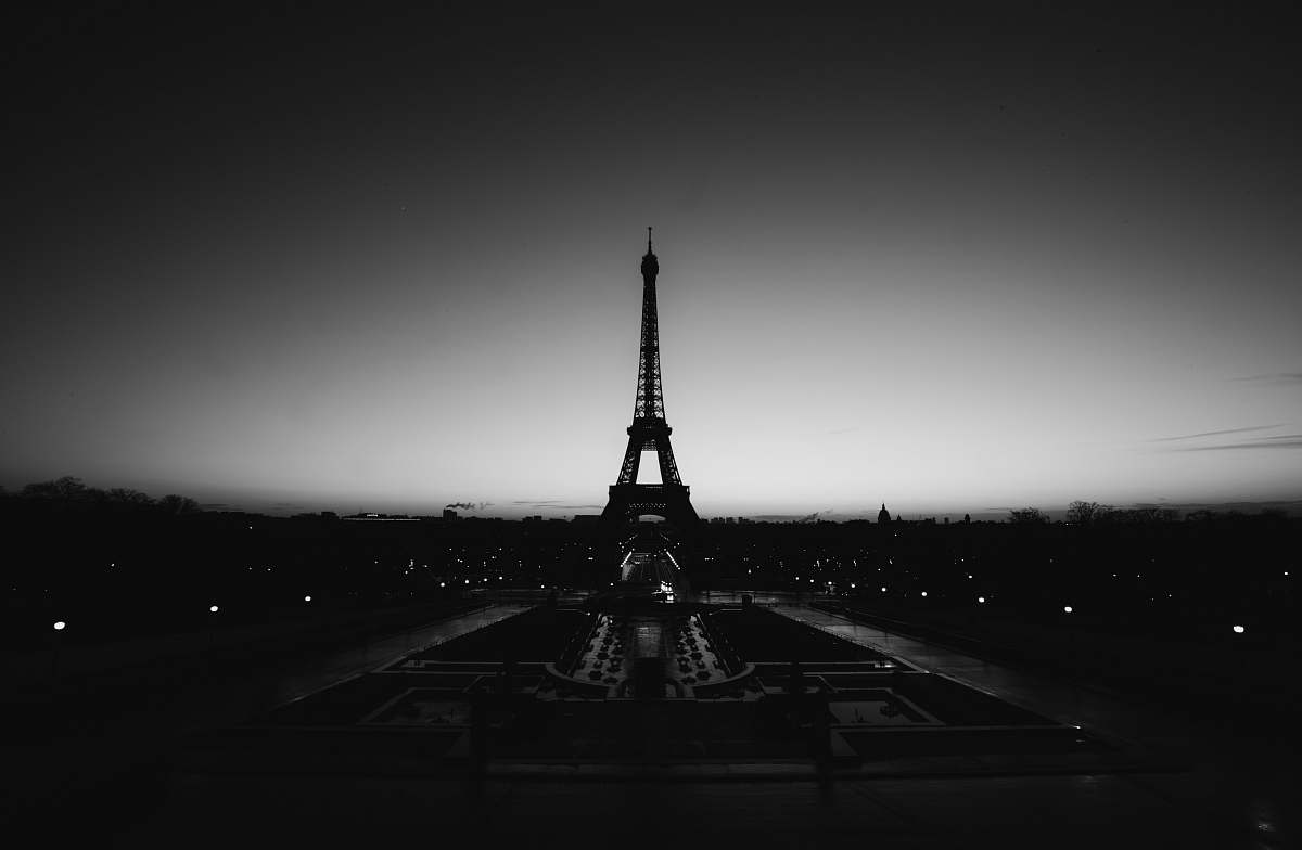 black-and-white grayscale photo of Eiffel tower steeple