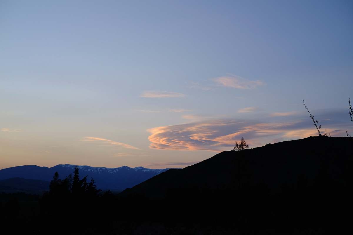 sky silhouette mountain during golden hour dusk