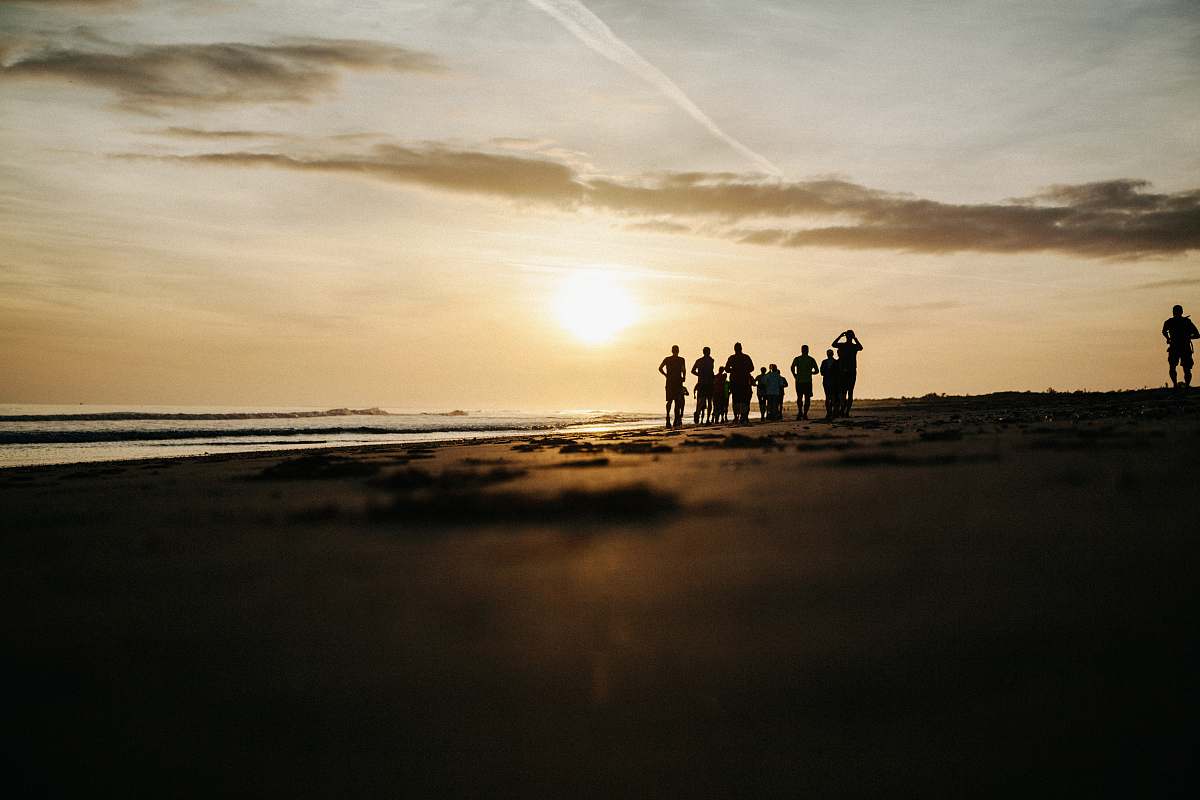 beach silhouette of people at seashore people