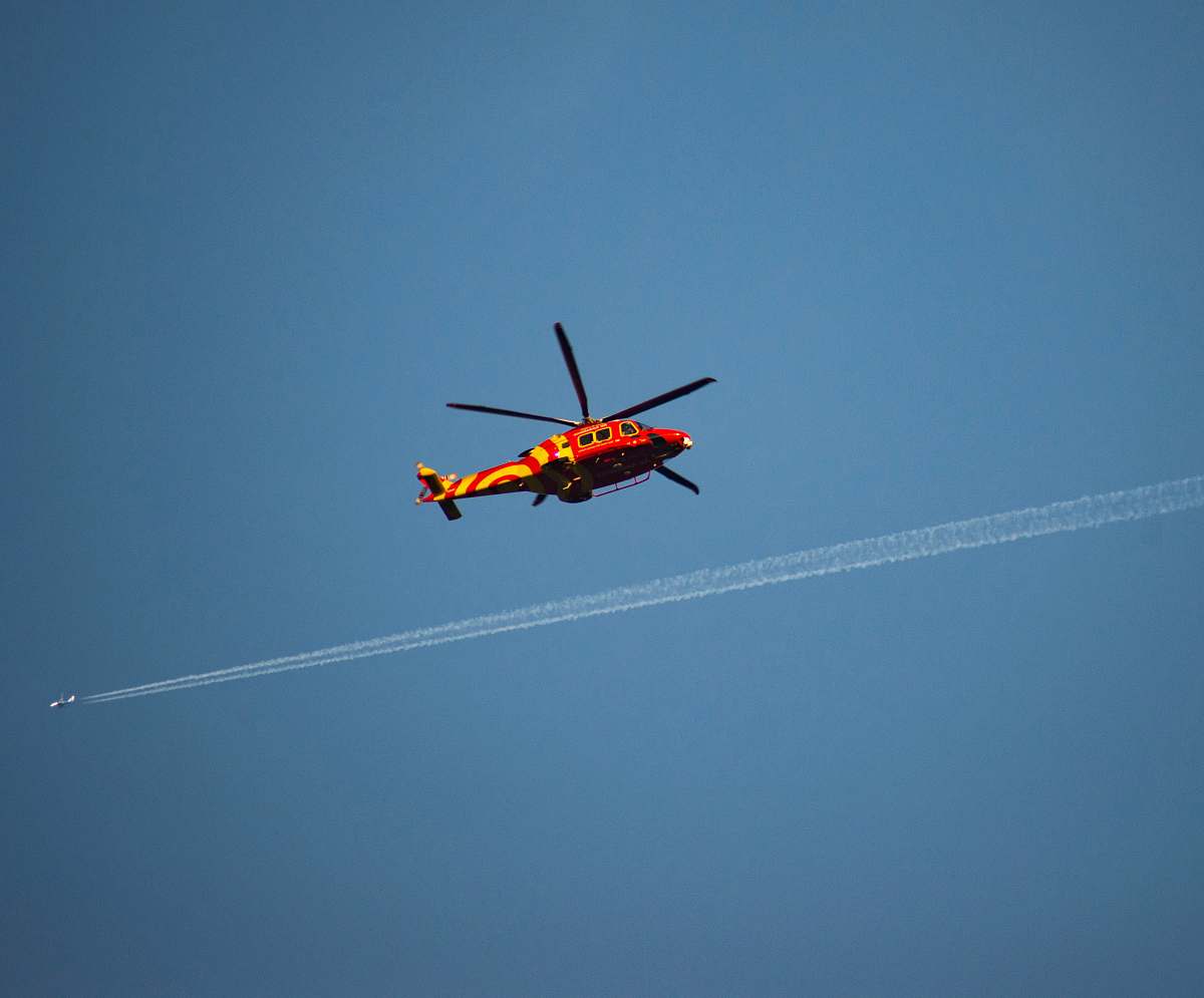 transportation red and yellow helicopter aircraft