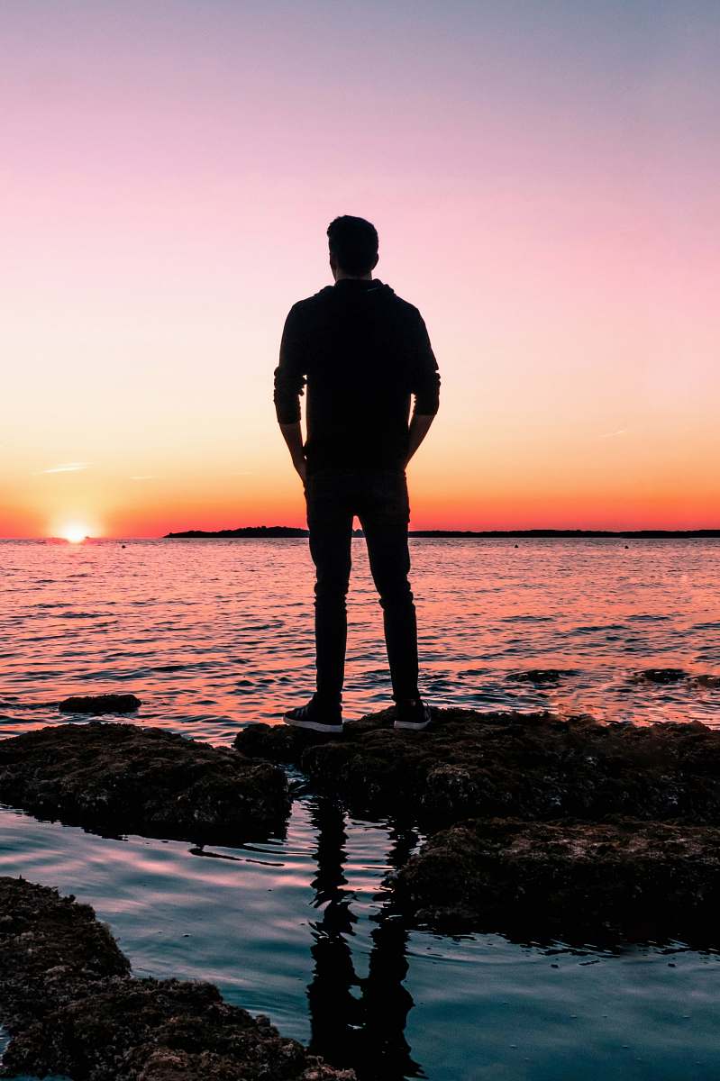 person body of water standing