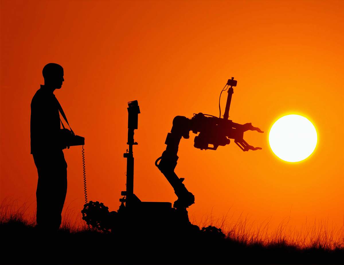 person man controlling robot silhouette