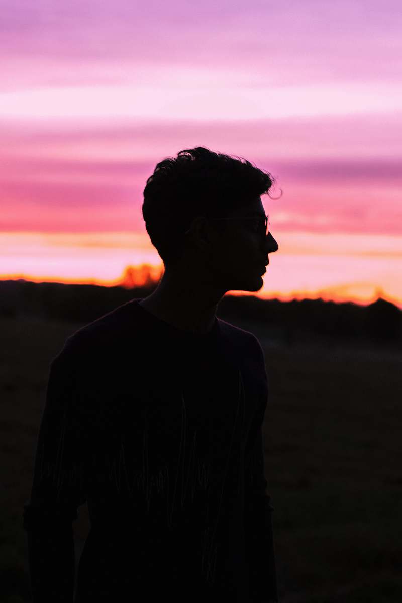 person man wearing black frame sunglasses nature