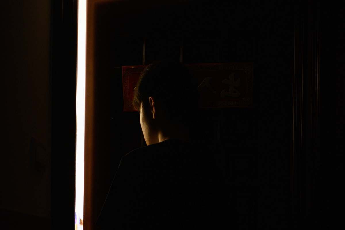 person person facing back light
