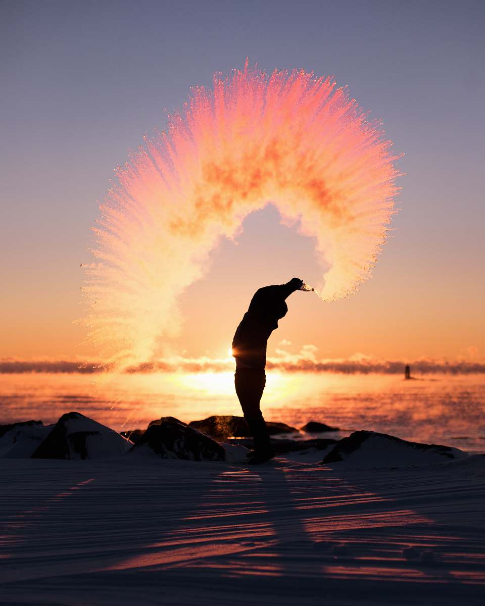 person person throwing dust outdoors
