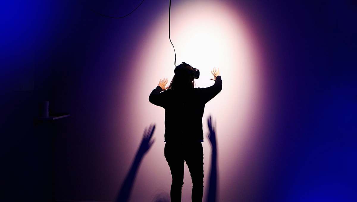 person person using VR headset lighting