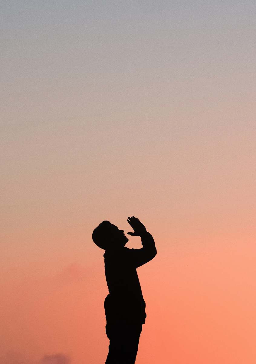 person silhouette of man during golden hour silhouette