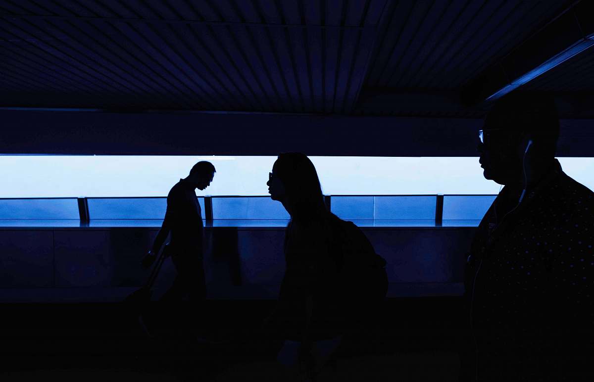 person silhouette of people inside a dark room people