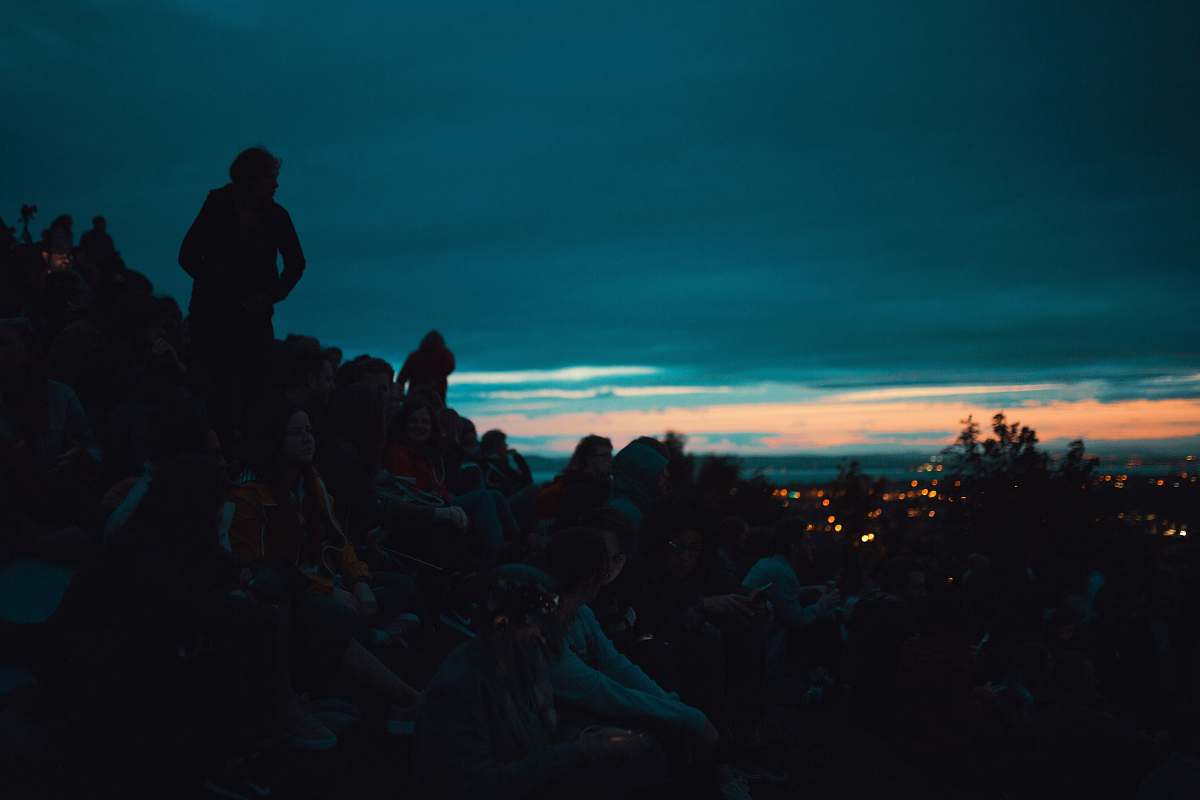 person silhouette photo of people on top of the mountain people