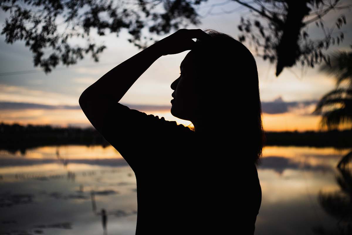 person silhouette photograph of woman silhouette