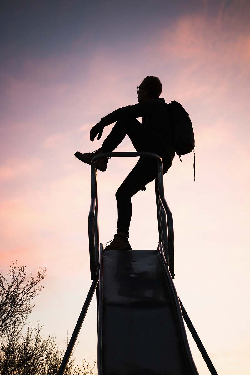 person silhouette photography of man with backpack people