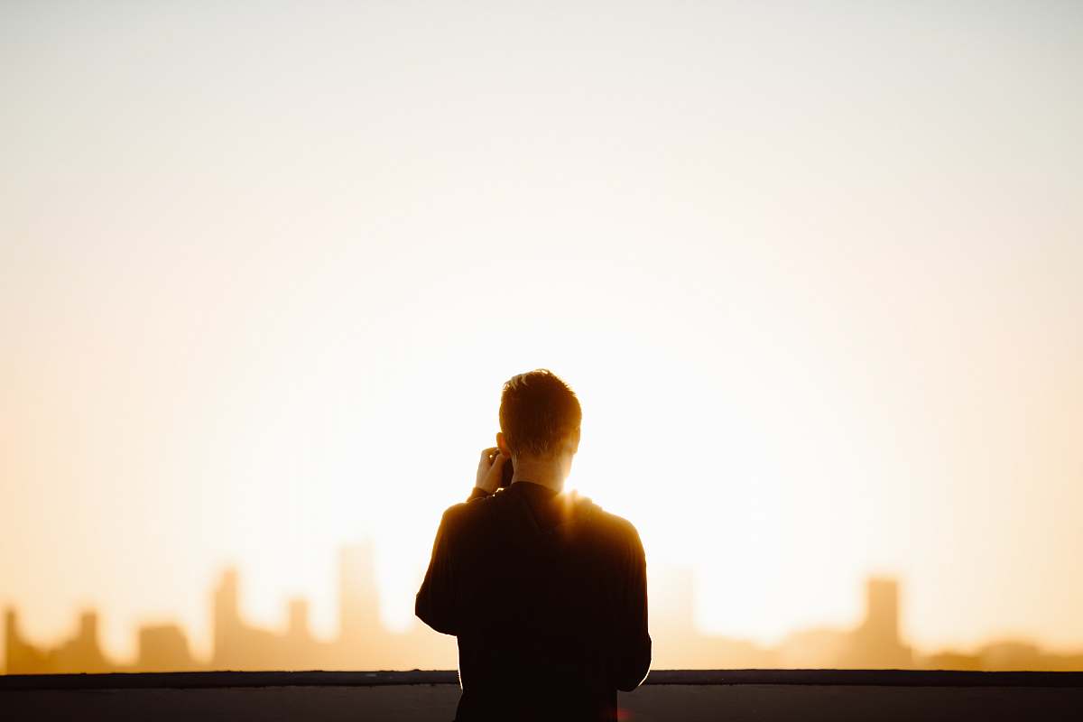person standing man wearing black shirt during daytime nature