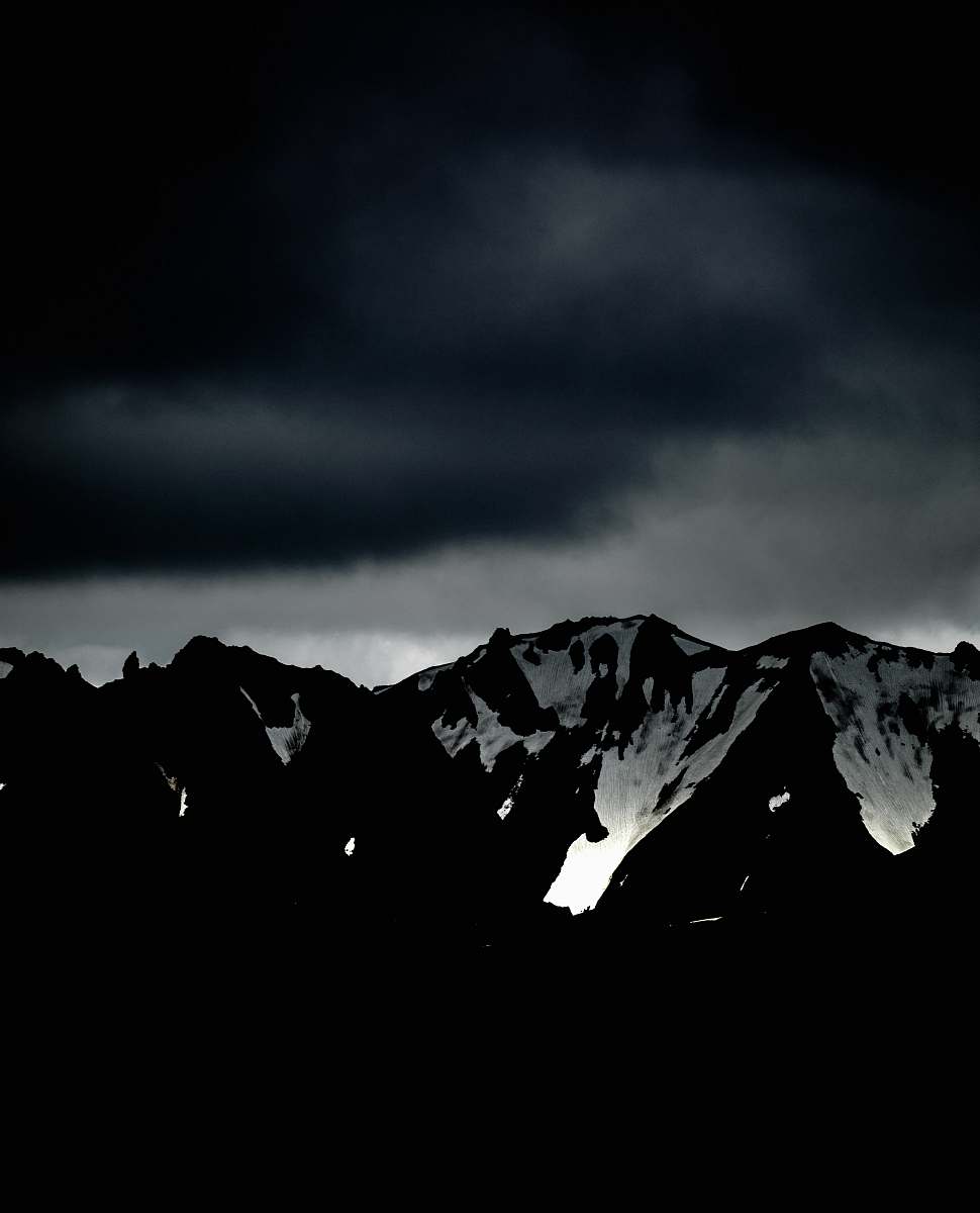 mountain clouds over mountain range alps