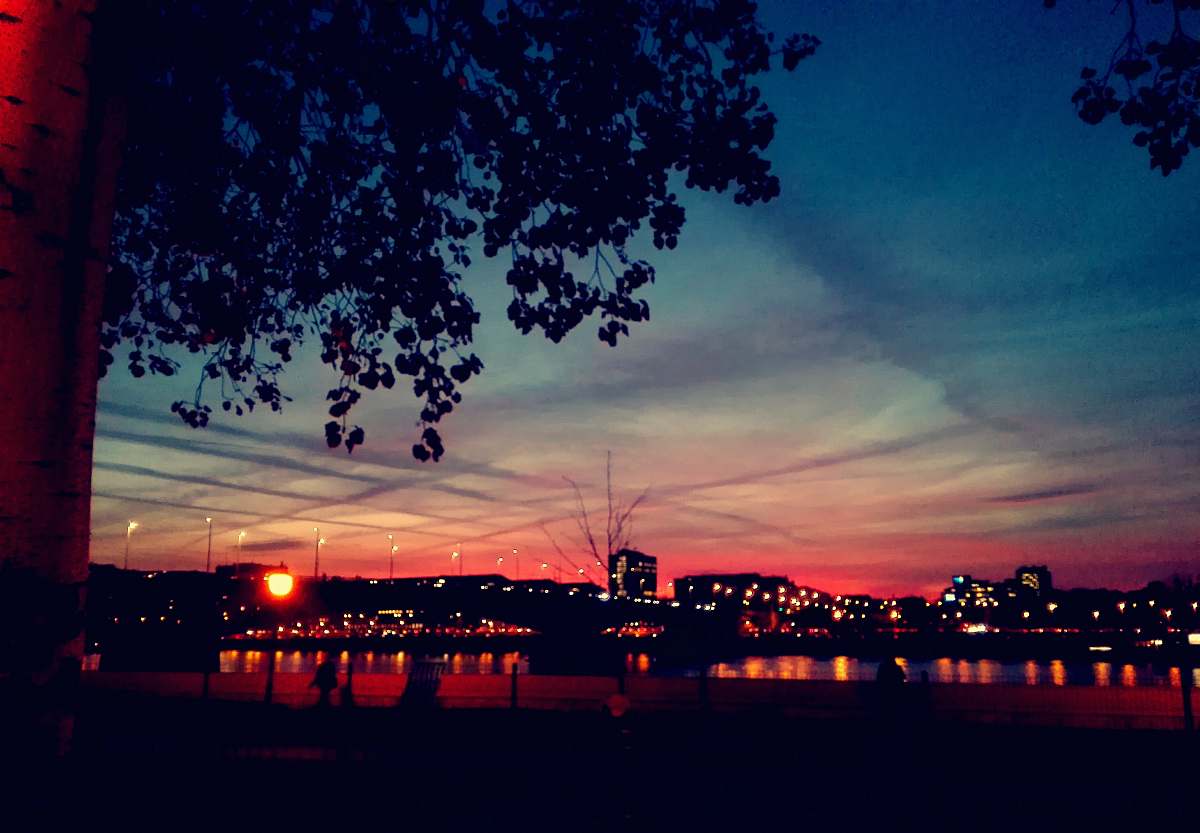 outdoors crimson sky over city by the bay at dusk sky