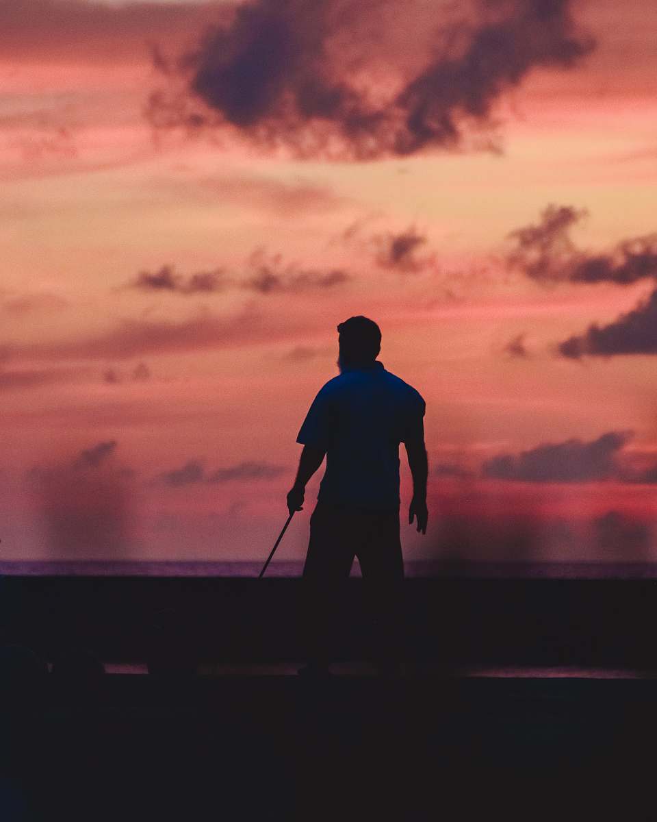 human man holding stick person