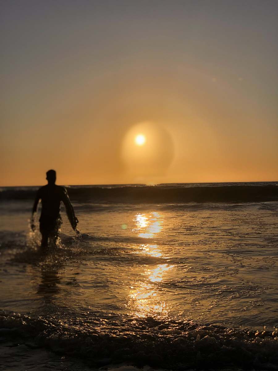 person man walking in water human