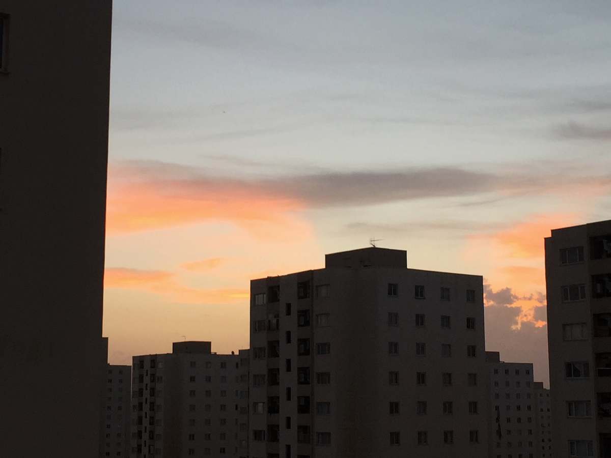 outdoors orange sky over city skyline at dusk dawn