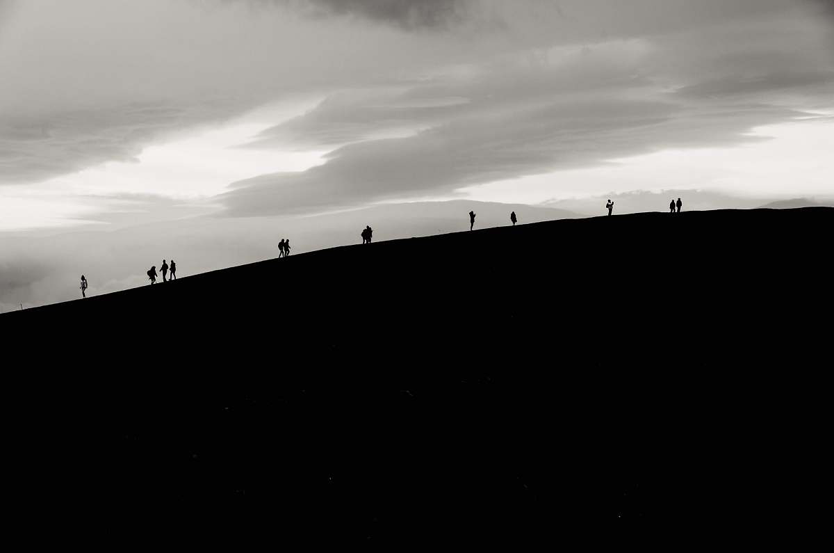 outdoors silhoette of person walking mountain human